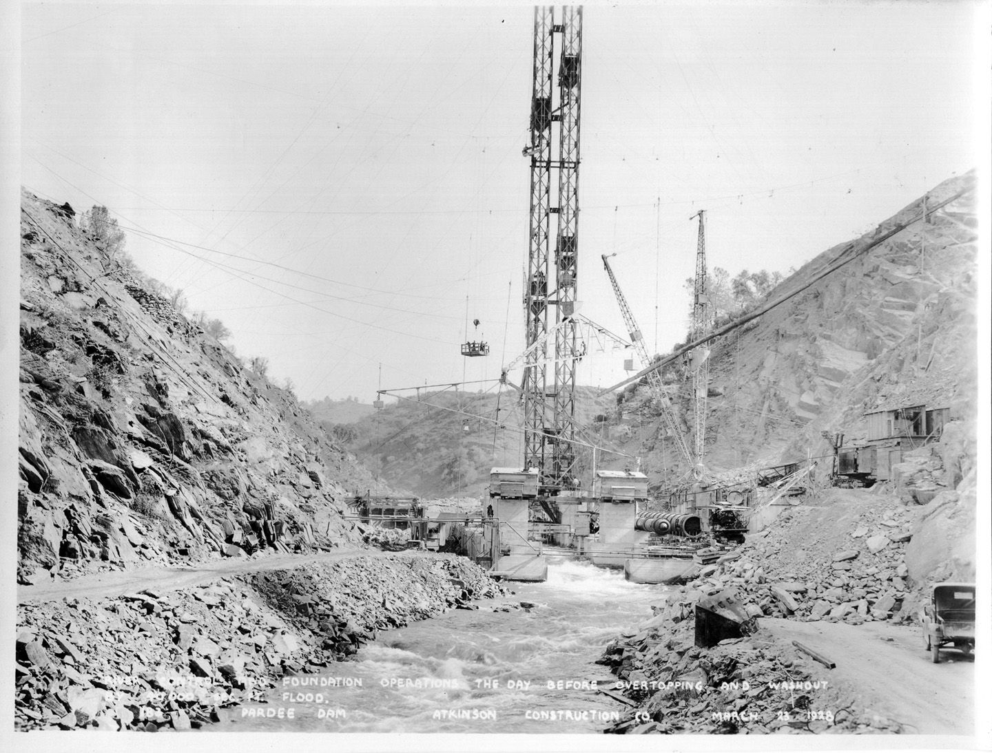 River control foundation operations the day before overtopping and washout 40,000 sec. ft. flood. (1928)	