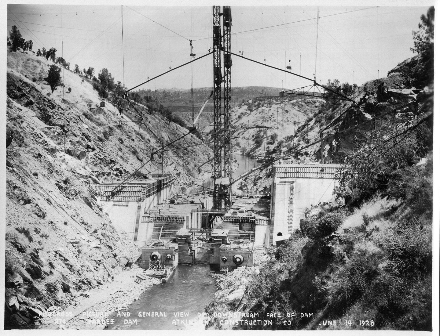 Porgress picture and general view of downstream face of dam. (June 1928)
