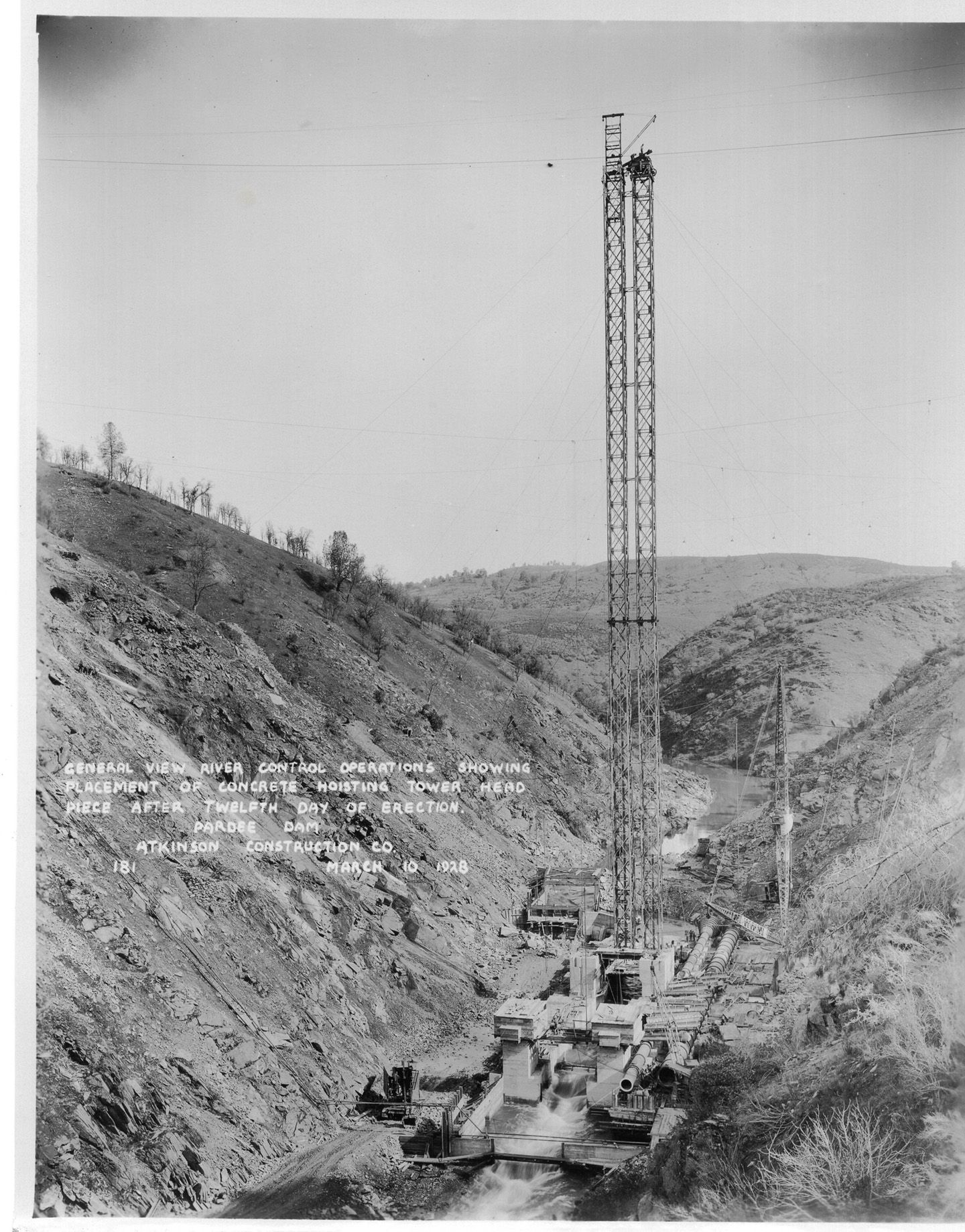 General view river control operations showing placement of concrete hoisting tower head piece after twelfth day of erection. (1928)	
