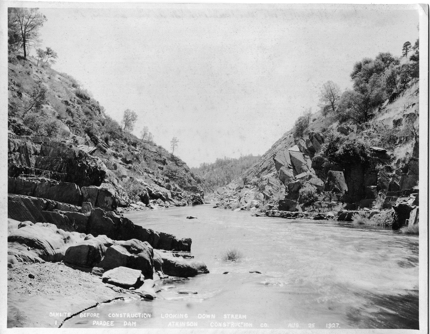 Dam site. Before construction looking down stream (August 1927).