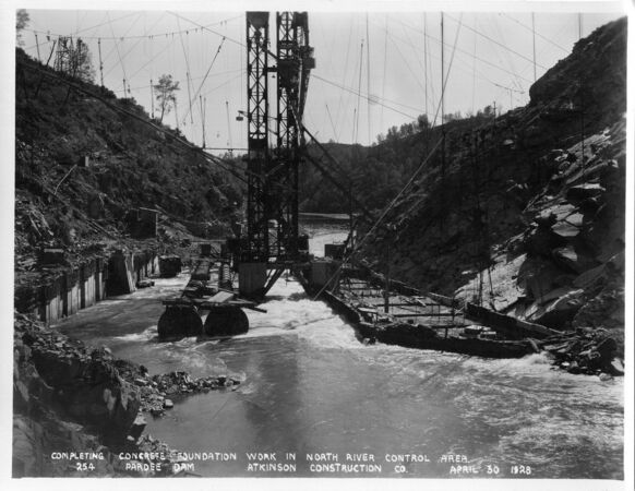 Completing concrete foundation work in north river control area. (April 1928)