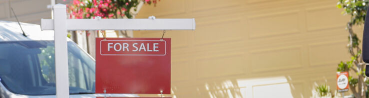 House with for sale sign