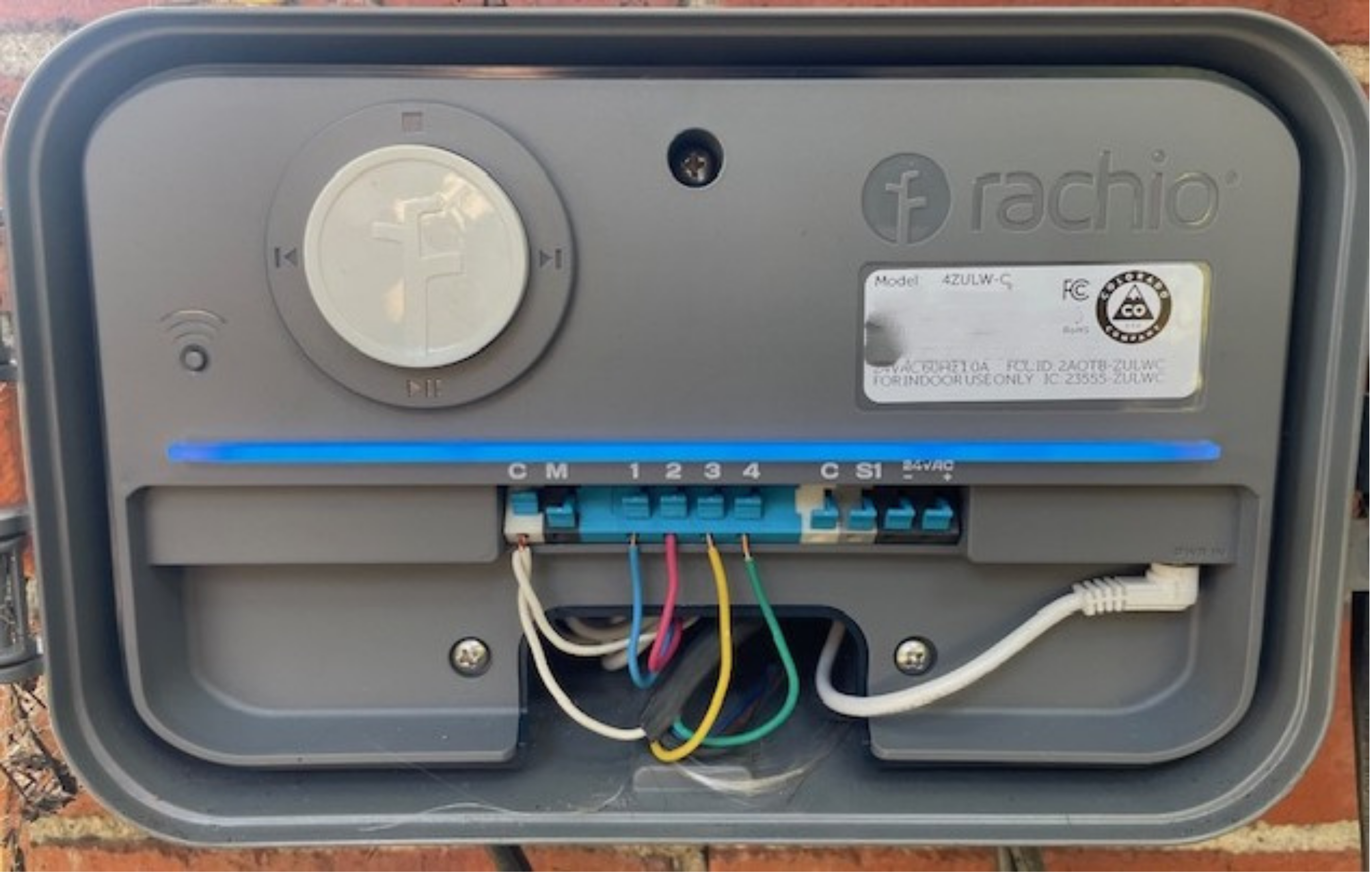 Photo of installed new controller showing connected valve wiring